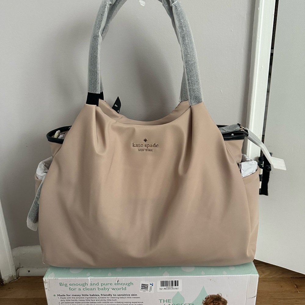 Kate Spade Tan Baby Bag with Spacious Design